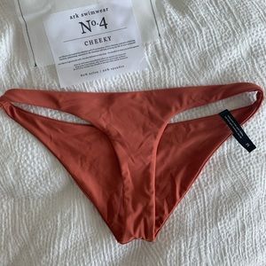 ark swimwear NWT cheeky bottoms in rust! Size M